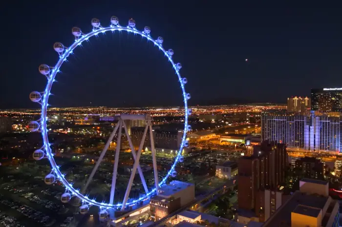 High Roller observation wheel illuminated over Las Vegas at night